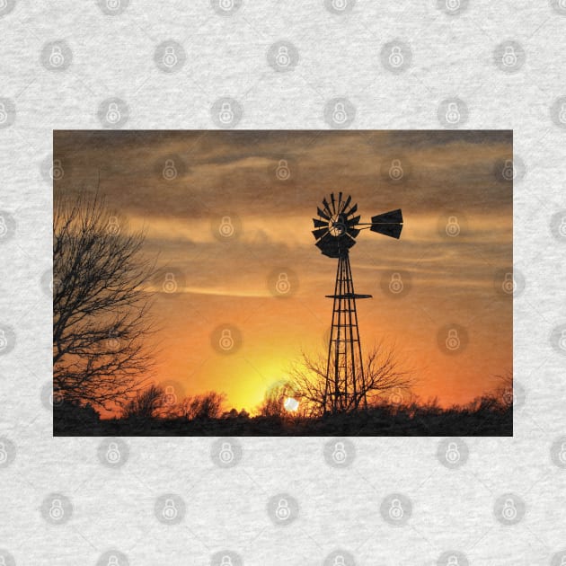 Kansas Blazing orange sunset with a Windmill silhouette with clouds. by ROBERTDBROZEK